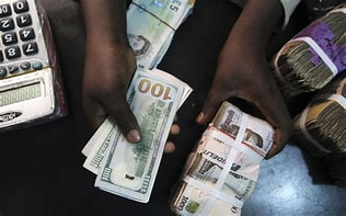 Naira gains as banks offload dollars into FX market.